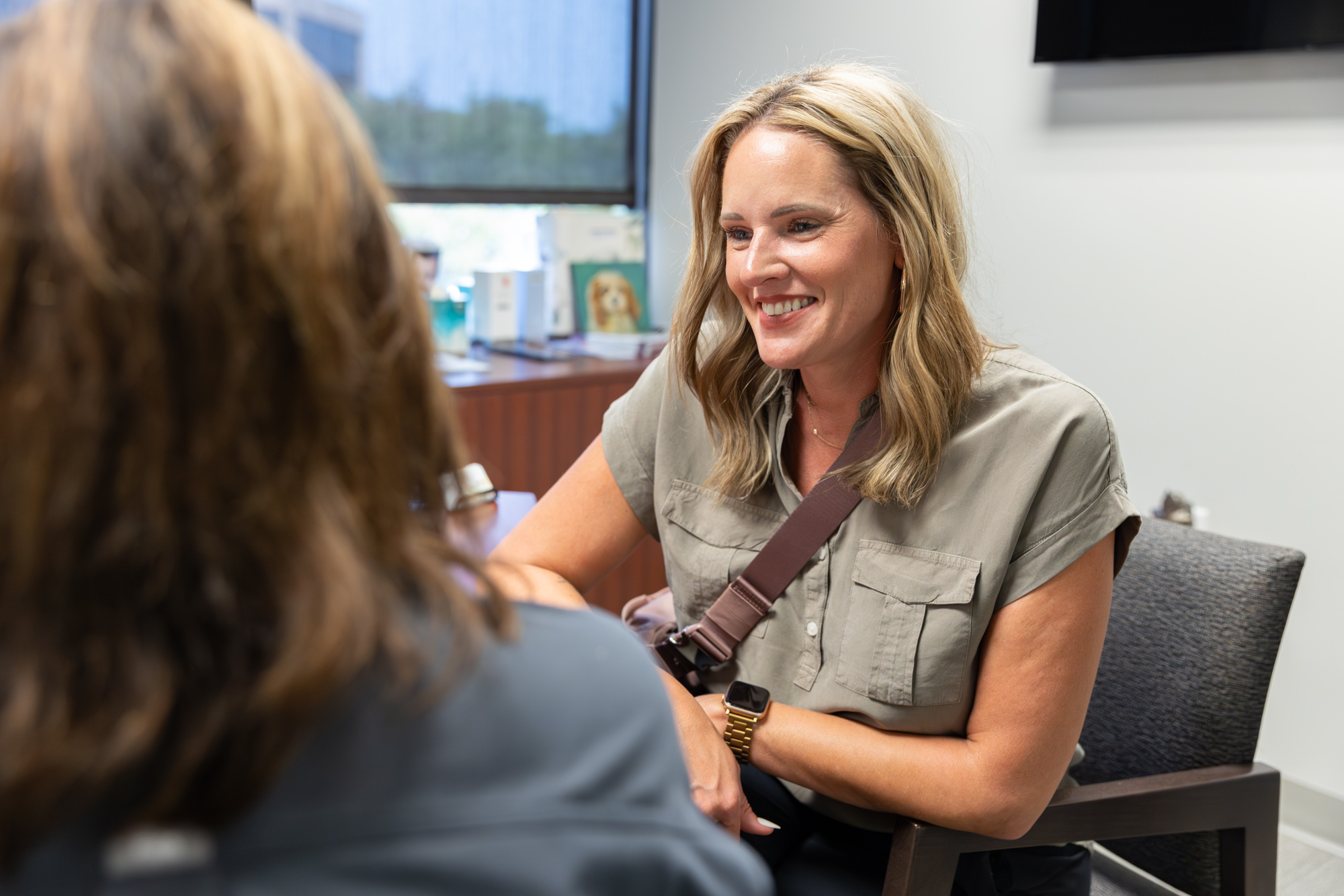 A woman and her medical provider discussing melasma treatment in Memphis